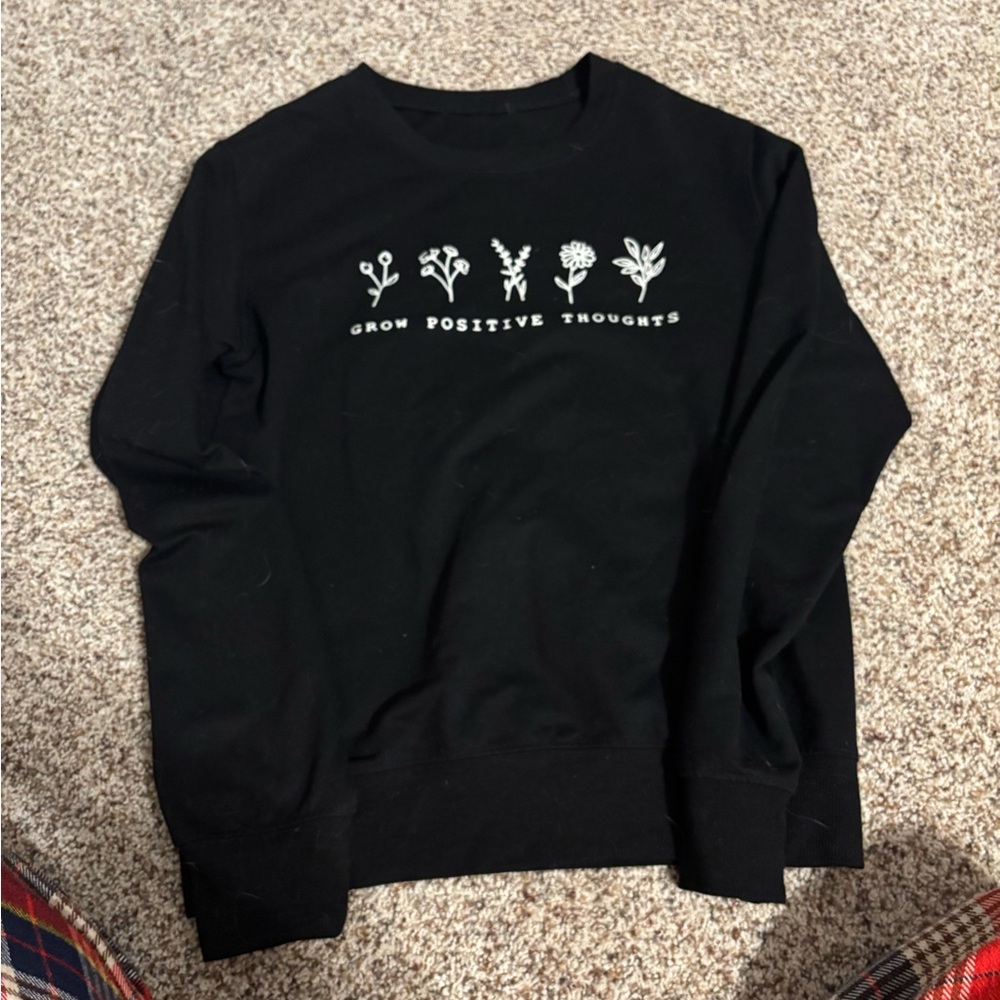 Women’s black crewneck